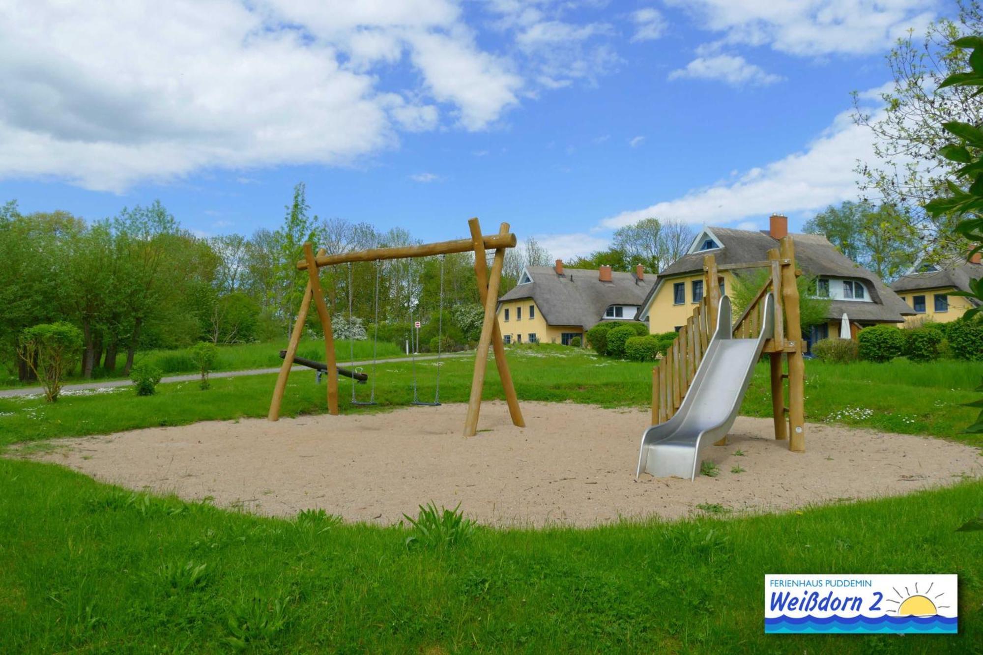 Familienfreundliches Reetdachhaus Weissdorn 2 Villa Puddemin Exterior foto
